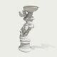 Natural white marble cherub flower planter statue with floral carving, flowing drapery, and decorative bowl on a clean background.