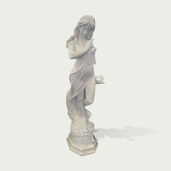 White marble female sculpture with graceful drapery, calm expression, and carved wave details shown on a clean product background.