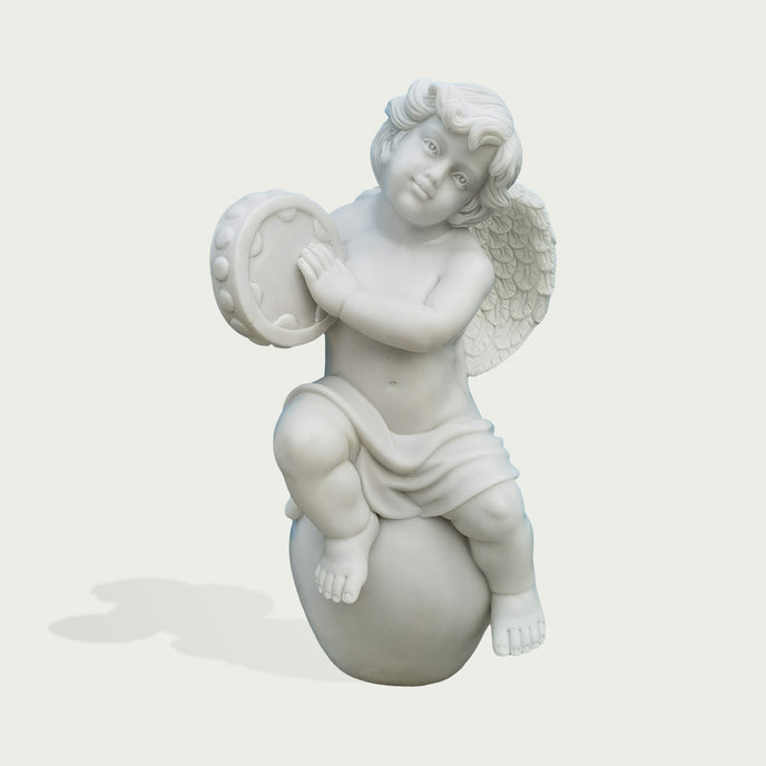 Natural white marble cherub tambourine statue with feathered wings, seated pose, soft drapery, and sweet carved facial details.