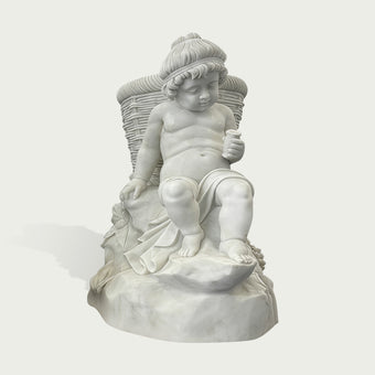 Natural white marble child statue seated with a woven basket, small cup, draped cloth, and fruit details on a clean background.