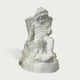 Natural white marble child statue seated with a woven basket, small cup, draped cloth, and fruit details on a clean background.