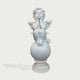 A white marble-style cherub statue with wings, seated on a round pedestal base against a light gray background.