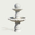 White marble two tier fountain with decorative carved pedestal and round sphere top, elegant classical outdoor water fountain sculpture