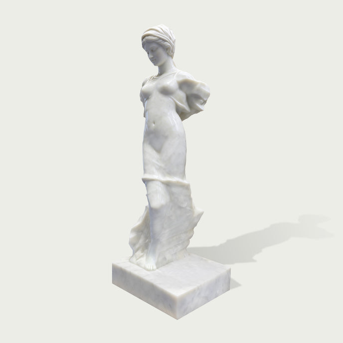 Back view of white marble female statue showing detailed flowing robes and sculptural craftsmanship