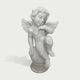 Hand carved white marble cherub sculpture with peaceful expression, delicate wings, and smooth polished stone finish