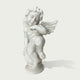 White marble cherub angel statue sitting on a decorative sphere with carved wings and detailed classical sculpture design