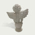 Back view of a white marble cherub angel sculpture showing detailed feathered wings and handcrafted stone carving