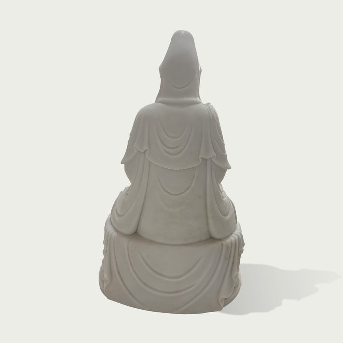 Back view of a white marble Kwan Yin statue featuring smooth carved robes, elegant silhouette, and traditional Buddhist art design