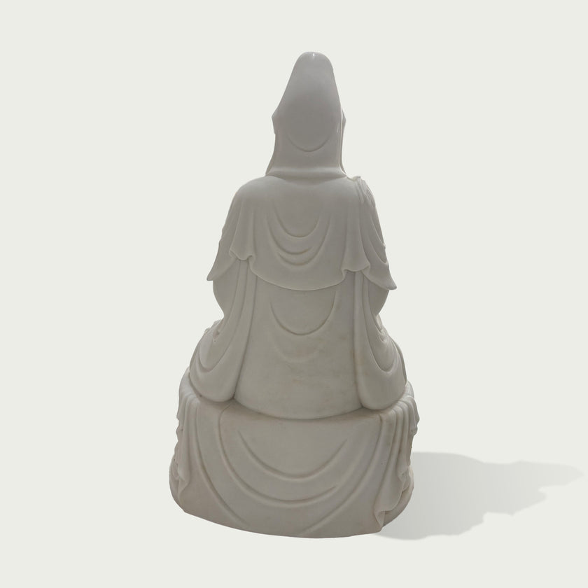 Back view of a white marble Kwan Yin statue featuring smooth carved robes, elegant silhouette, and traditional Buddhist art design