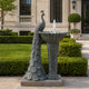 Greyish green marble peacock fountain sculpture with detailed feather tail and birdbath design for elegant outdoor garden decor
