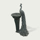 Side view of elegant peacock fountain sculpture with long detailed tail and decorative pedestal for luxury garden landscaping