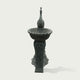 Front view of grey marble peacock fountain sculpture featuring carved bird details and classic garden fountain design