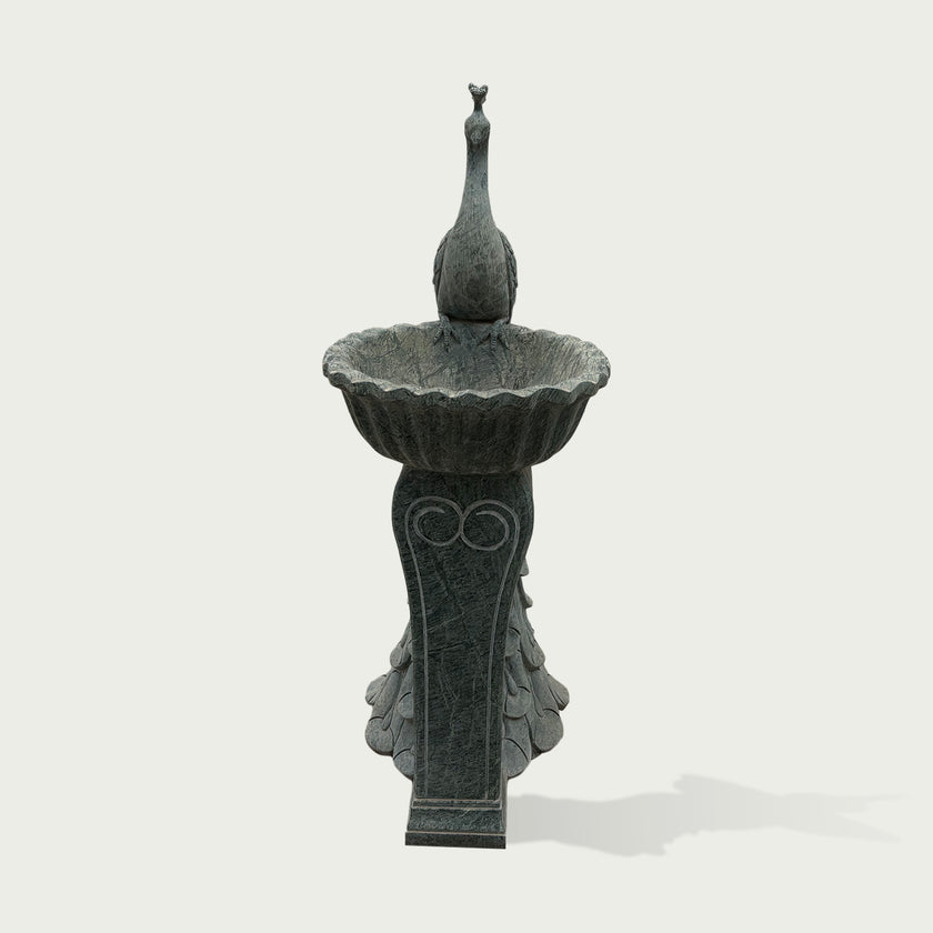 Front view of grey marble peacock fountain sculpture featuring carved bird details and classic garden fountain design