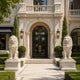 Pair of white marble lion guardian statues displayed at a luxury home entrance with elegant architectural landscaping