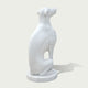 Back view of a white marble greyhound statue displaying smooth curves, detailed form, and handcrafted stone sculpture quality.