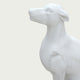 Close-up view of a white marble greyhound sculpture head with elegant features and polished stone carving details.