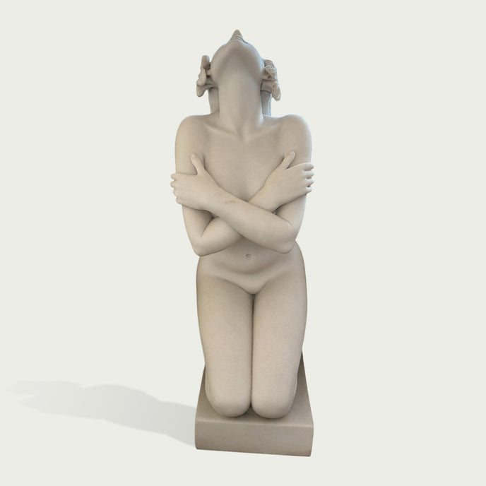 Classical white marble kneeling woman sculpture featuring smooth carved details and timeless artistic beauty
