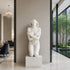 White marble kneeling woman sculpture with elegant classical form and artistic details for luxury interior decoration