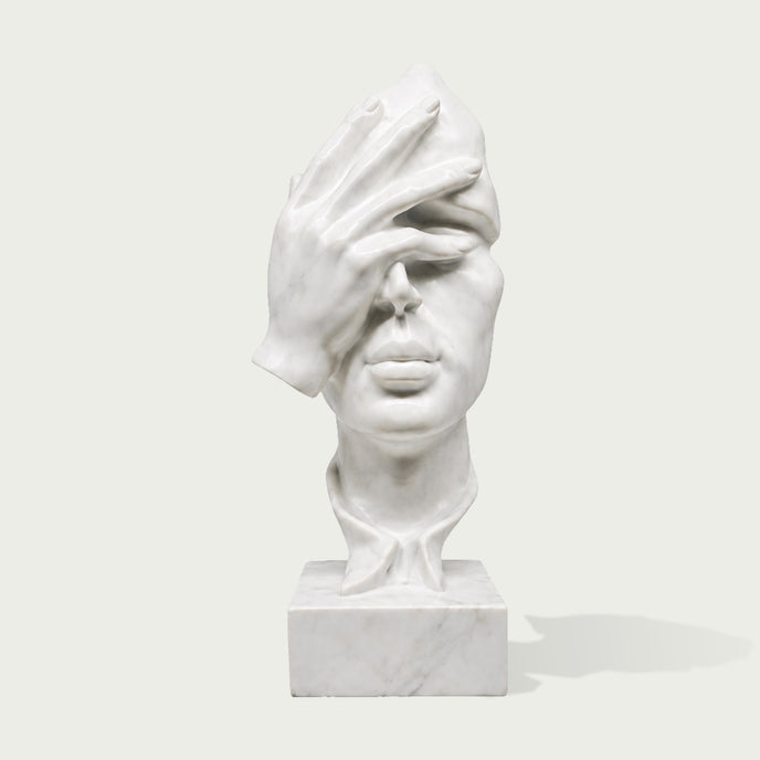 White marble hand over face sculpture bust with modern artistic expression and elegant carved details for luxury interior decor