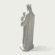 Back view of white marble Virgin Mary holding Child Jesus sculpture, showing detailed flowing robes, crown design, and handcrafted religious statue details