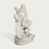 Side view of a white marble Laughing Buddha seated on a fish sculpture, with smooth handcrafted details and wave base design representing abundance and blessings.