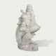Three-quarter view of a white marble Buddha riding a fish statue, showing intricate carving, joyful expression, and traditional symbolism of wealth and prosperity.