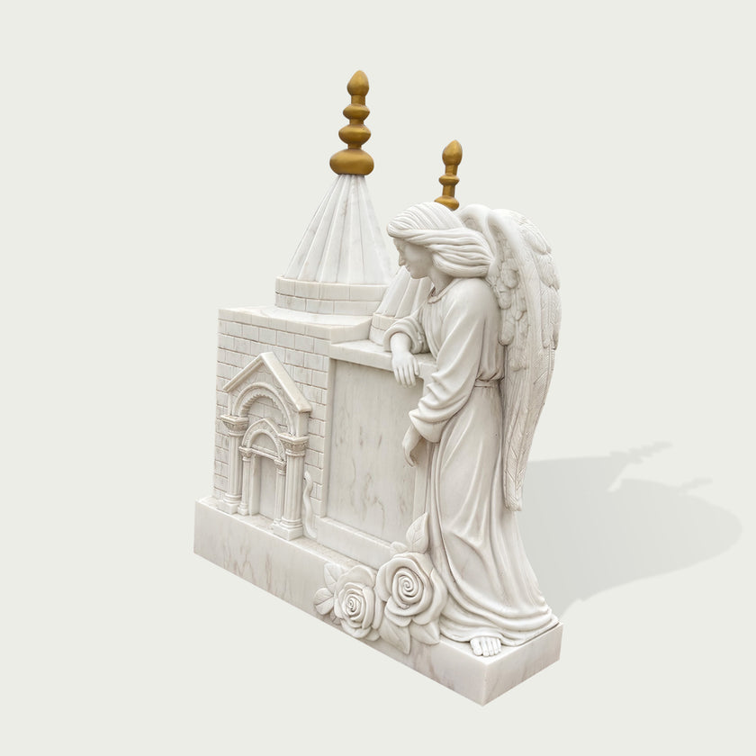 Side view of white marble angel memorial monument showing detailed feathered wings, church structure, polished stone surface, and handcrafted cemetery artwork.
