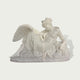 White marble sculpture of a reclining angel figure with large wings, flowing fabric, and classical carved details