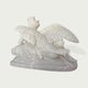 Side view of a white marble angel sculpture with detailed wings, elegant pose, and smooth classical stone carving