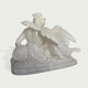 Back view of a white marble angel statue showing carved feather wings, flowing robes, and refined sculptural craftsmanship