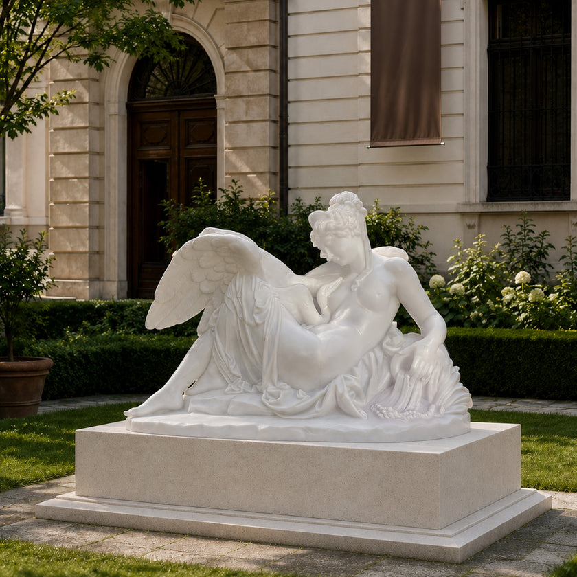 Elegant white marble angel sculpture featuring detailed wings, graceful reclining pose, and classical craftsmanship, perfect for luxury gardens, villas, estates, and interior art displays.