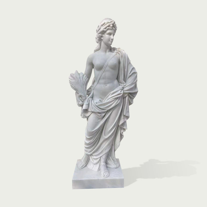 White marble classical female sculpture featuring flowing fabric, ancient Greek inspired design and detailed craftsmanship for outdoor garden decoration.