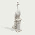 Classical white marble peacock bird sculpture featuring smooth body carving, detailed feathers, decorative pedestal, and timeless garden art style.