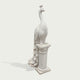 Classical white marble peacock bird sculpture featuring smooth body carving, detailed feathers, decorative pedestal, and timeless garden art style.