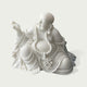 Close view of hand carved white marble Maitreya Buddha statue with detailed facial expression, beaded necklace, smooth stone texture, and traditional Buddhist artistry.