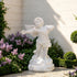 Side view of a white marble cherub statue showing intricate feathered wings, flowing fabric details, and handcrafted classical sculpture craftsmanship.