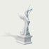 Rear view of white marble Saint Michael angel statue showing large feathered wings, flowing cloak details and handcrafted stone sculpture finish.