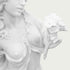 Close-up of a white marble woman statue showing her carved face, flowing garment, hand holding a flower bouquet, and finely sculpted floral details.