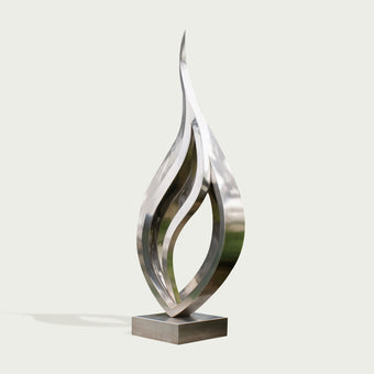 Metallic silver mirror polished stainless steel  sculpture with wavy design
