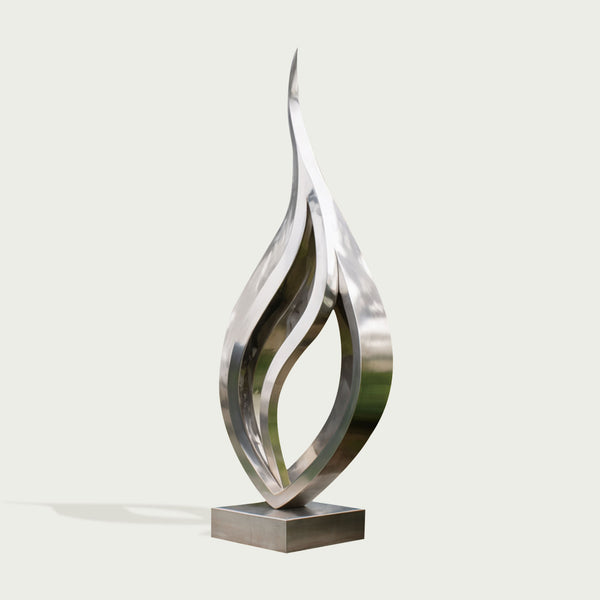 Metallic silver mirror polished stainless steel  sculpture with wavy design