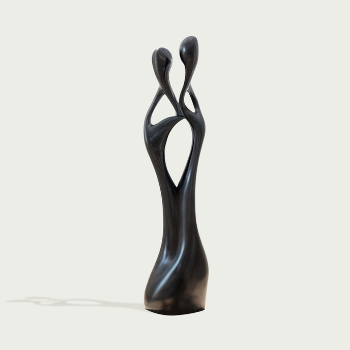 Black Abstract Intertwined Lovers Stainless Steel Sculpture on a white background