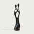 Black Abstract Intertwined Lovers Stainless Steel Sculpture on a white background