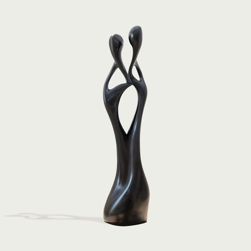 Black Abstract Intertwined Lovers Stainless Steel Sculpture on a white background