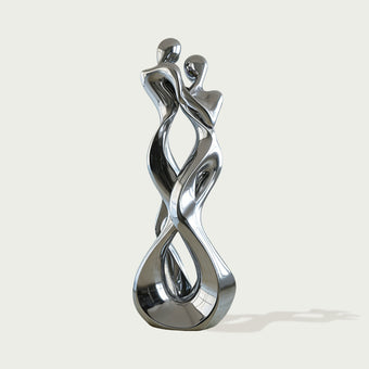 Abstract Embracing Lover Stainless Steel Sculpture  on a light gray background