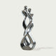 Abstract Embracing Lover Stainless Steel Sculpture  on a light gray background