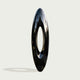Large Abstract Black Oval Stainless Steel Sculpture on a light gray background