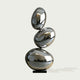 Large Mirror Polished Stainless Steel Sculpture Asymmetrical Spheres on a white background