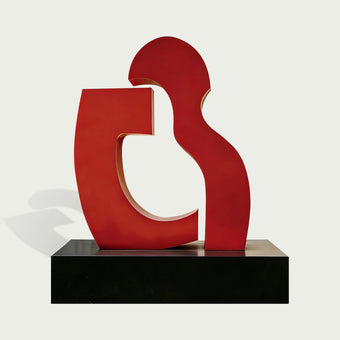 Contemporary Red Puzzle Abstract Stainless Steel Sculpture on a black base against a white background