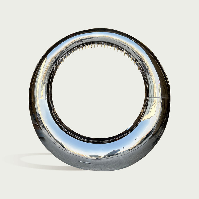 Mirror Polished Stainless Steel Sculpture Eclipse Loop  Water Fountain on a white background