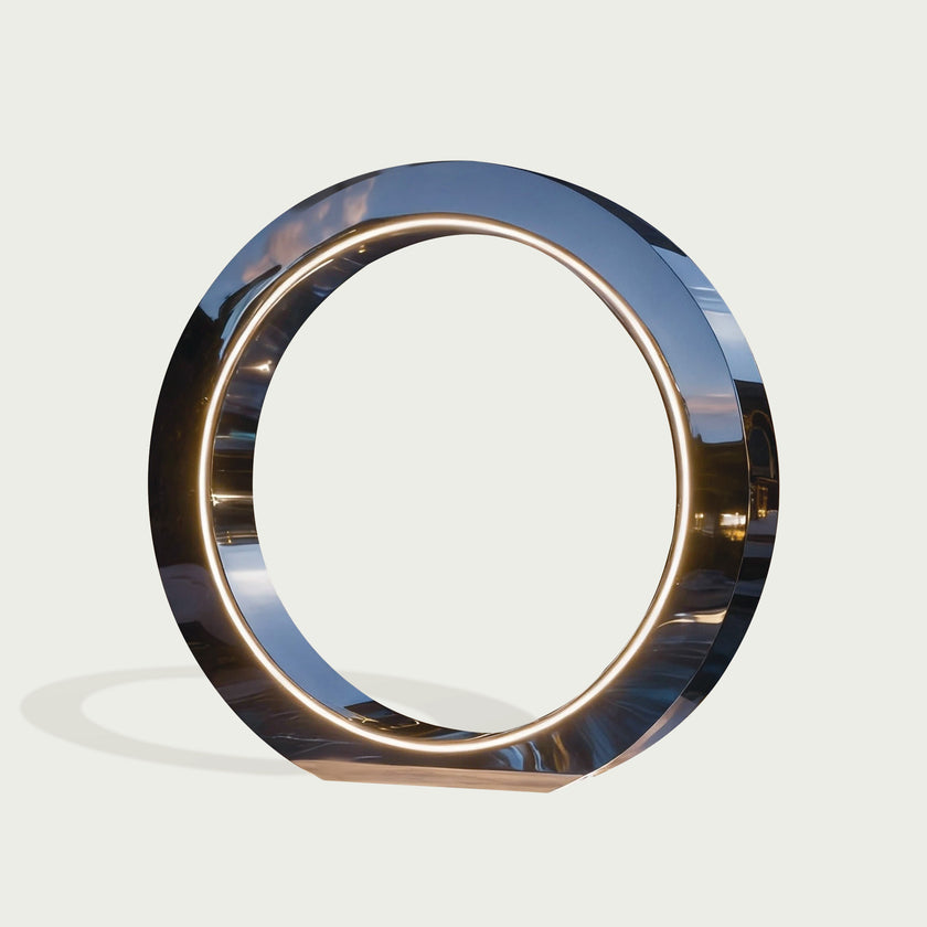 Modern Stainless Steel Lighting Sculpture Glowing Loop on a light gray background